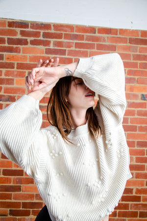 Bobble knit sweater in soft snow marle, worn by Ally